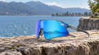 Fahrradbrille TR90 – auf einer Steinmauer vor dem See